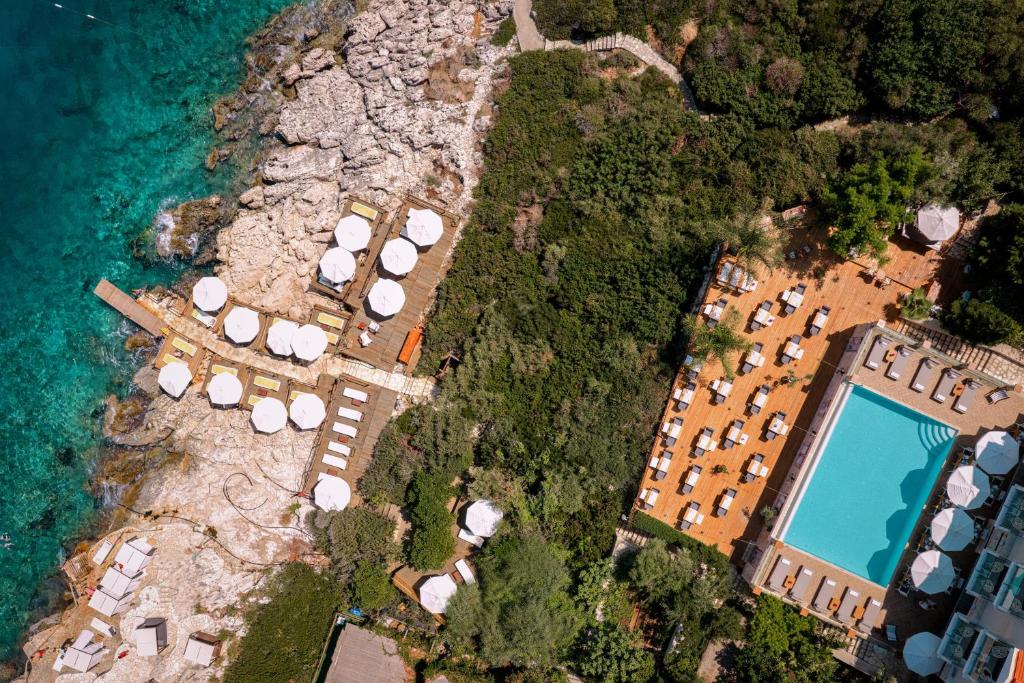 an aerial view of a resort with a swimming pool at Suna Sun Hotel - Adult Only in Kaş