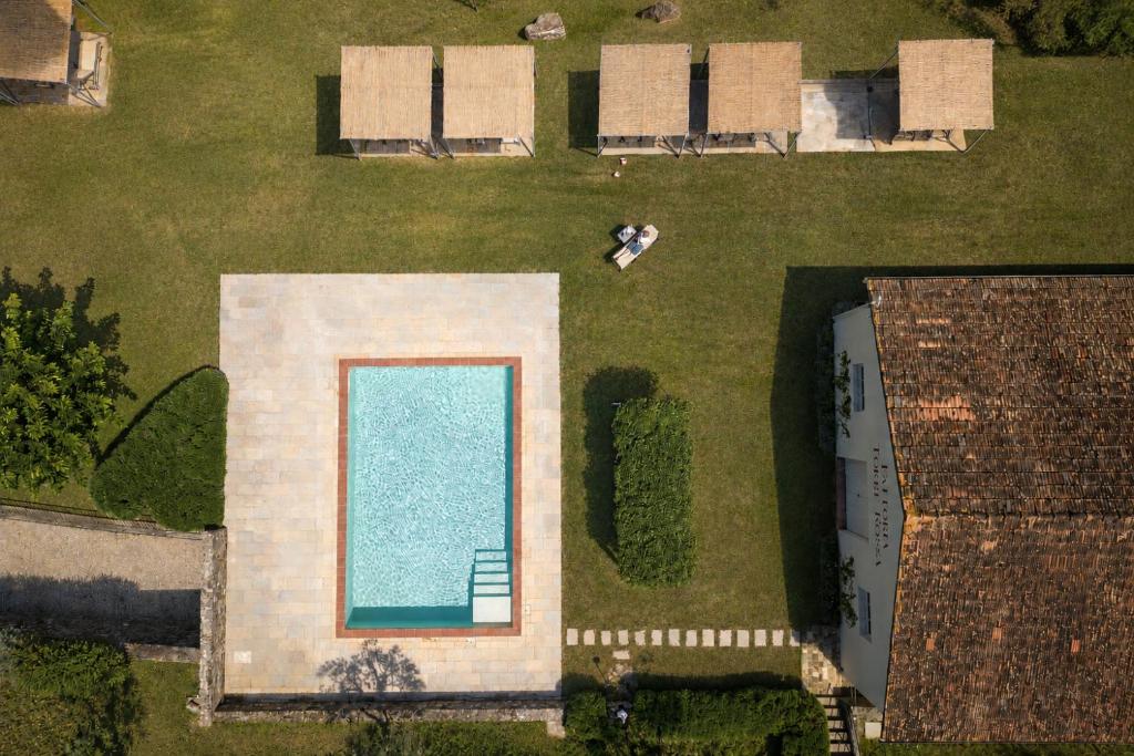 an overhead view of a swimming pool in a yard at Tenuta Torre Rossa Farm & Apartments in Impruneta