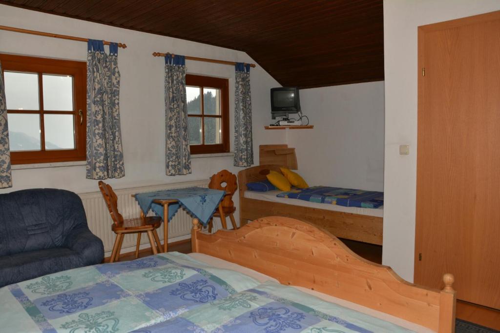 Postel nebo postele na pokoji v ubytování Klein Schöntal