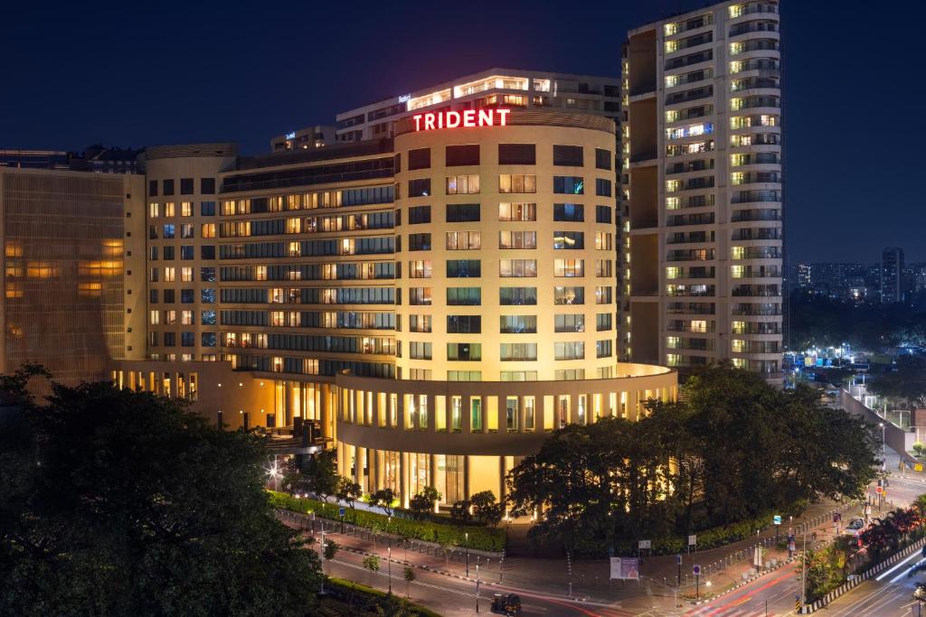 a hotel building with a hotel sign on top of it at Trident Bandra Kurla in Mumbai