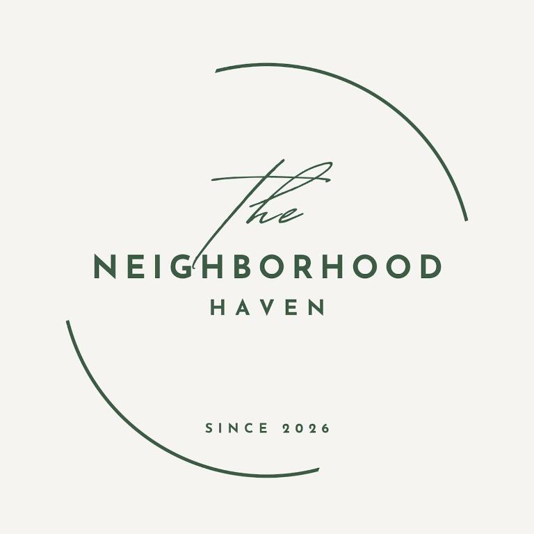 a logo for the kitchenhood tavern at The Neighborhood Haven in Richards Bay