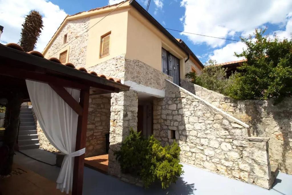 a view of the house from the outside at Charming Villa in Jezera with Private Pool in Jezera