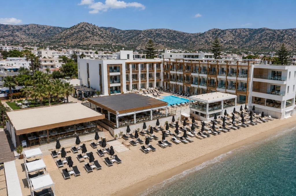 an aerial view of a resort on the beach at Enorme Ammos Beach - Adults Only in Malia
