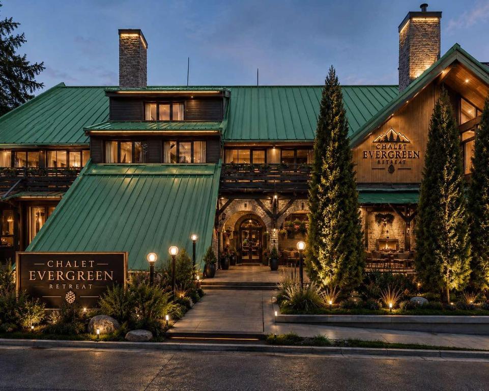 a large building with a green roof at Chalet Evergreen in Borovets