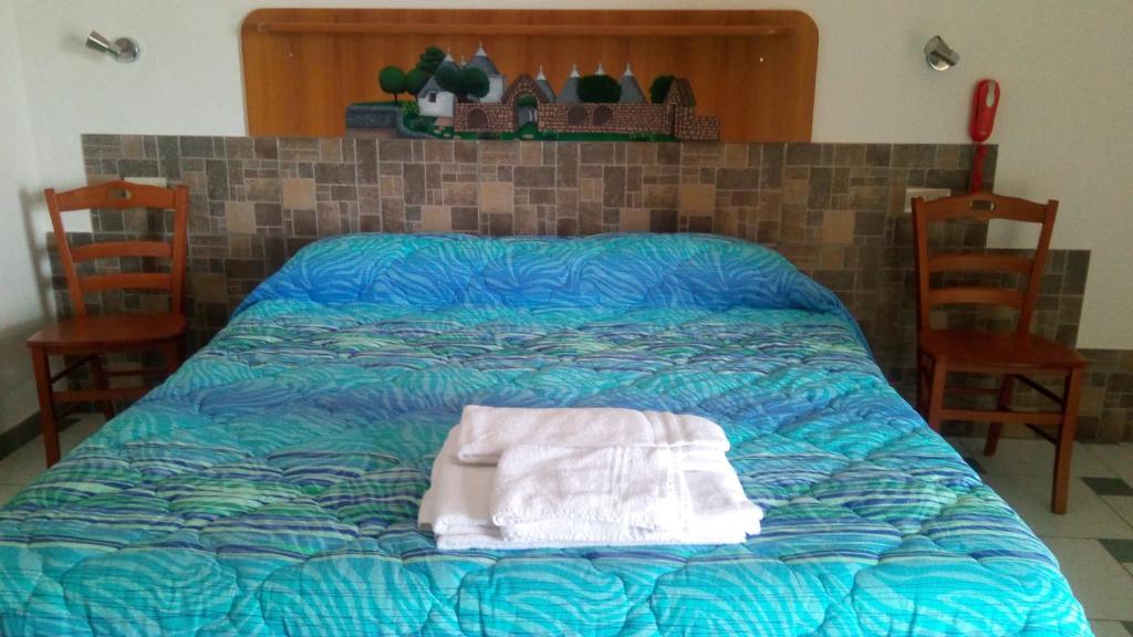 Posteľ alebo postele v izbe v ubytovaní Bed & Breakfast La Collinetta