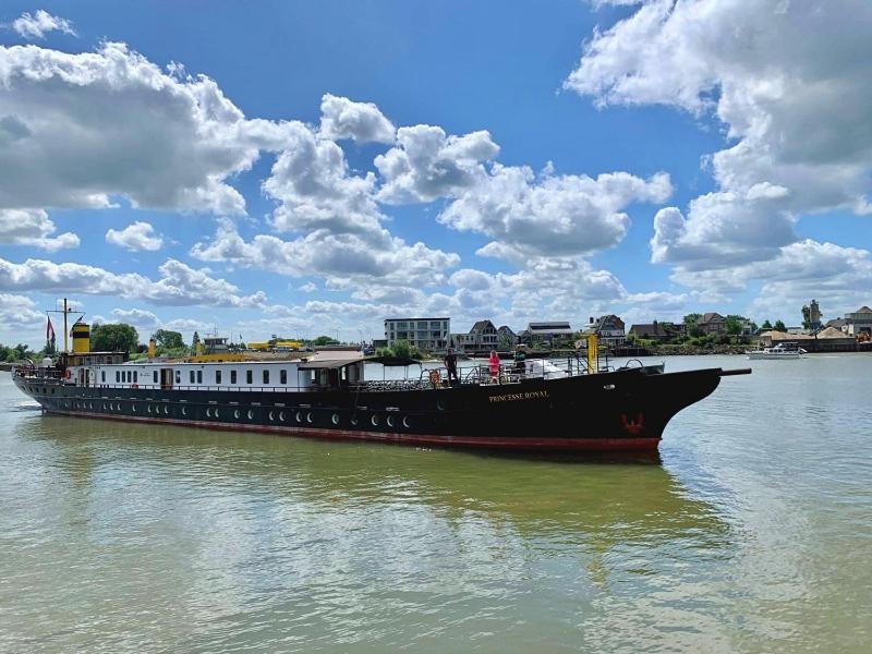 a large boat in the water on a river at Passengerschip Princesse Royal in Groningen