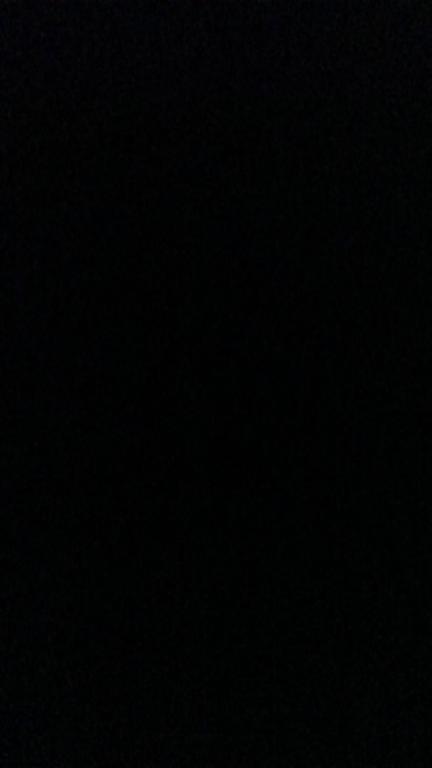 a black background with a plane flying in the sky at Casa Di Mario - Townhouse in Lavrio