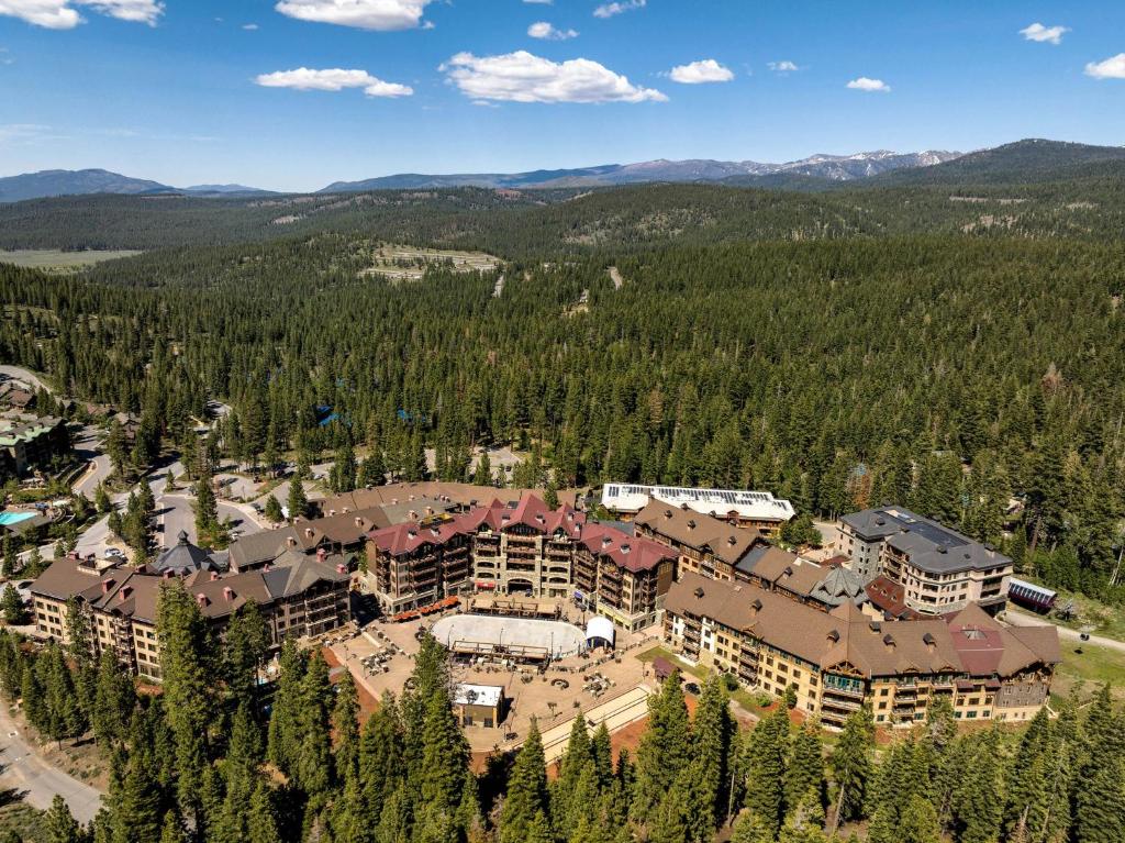 an aerial view of a resort with trees at Northstar Resort by Vail Resorts in Truckee
