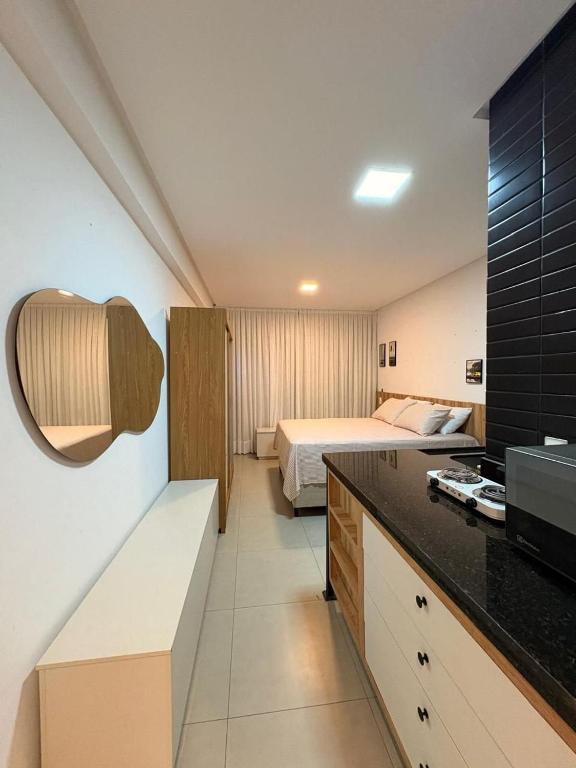 a room with a bed and a bedroom with a bed sqor at WestFit - Barreto - 709 in Mossoró