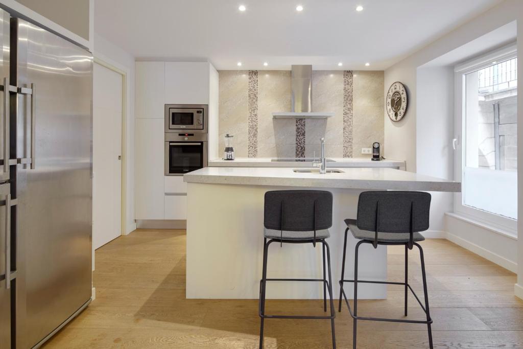 Kuchyňa alebo kuchynka v ubytovaní Hika Mika Apartment by FeelFree Rentals