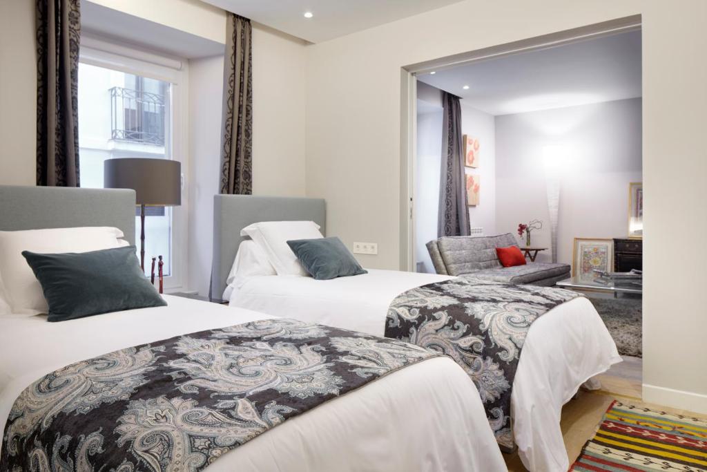 Posteľ alebo postele v izbe v ubytovaní Hika Mika Apartment by FeelFree Rentals
