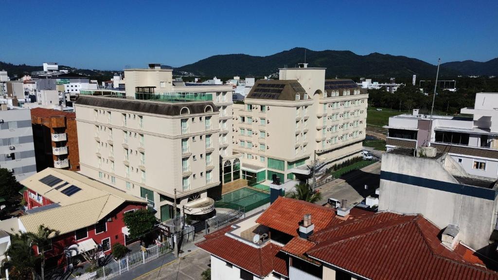 an aerial view of a city with buildings at Varadero Palace Hotel in Florianópolis