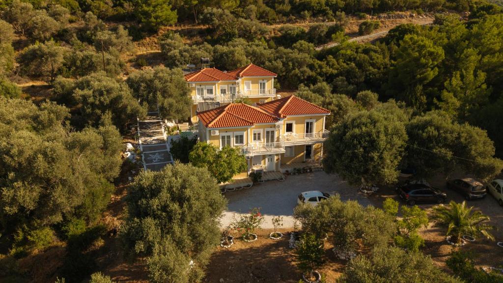 an aerial view of a large house with a yard at Jimmy Anna Apartments in Votsalákia
