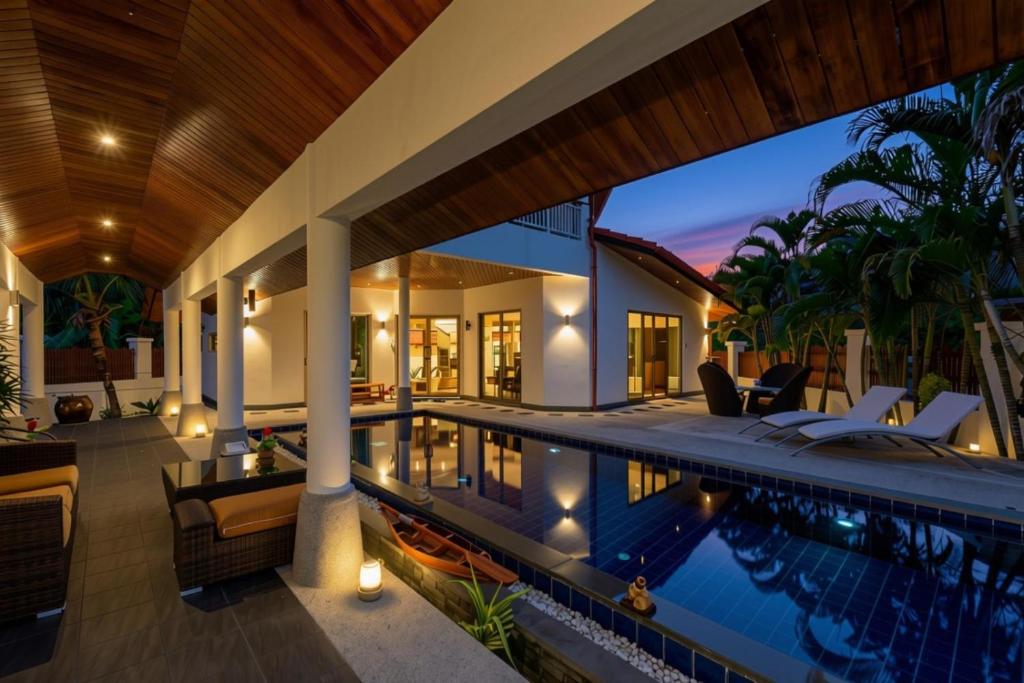 an image of a house with a swimming pool at Amber Pool Villa Your private slice of paradise in Rawai Beach
