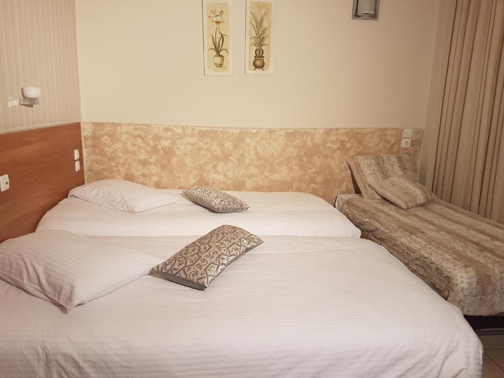 Postel nebo postele na pokoji v ubytování Hotel Ideal
