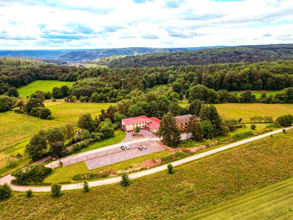an aerial view of a house in the middle of a field at Haus im Herrengrund in Schollbrunn