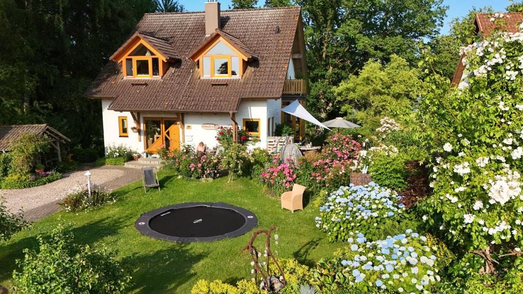 an aerial view of a house with a circle in the yard at Bellevue in Malente