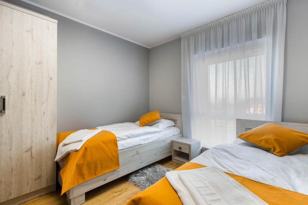Postel nebo postele na pokoji v ubytování MOTEL MO&JA