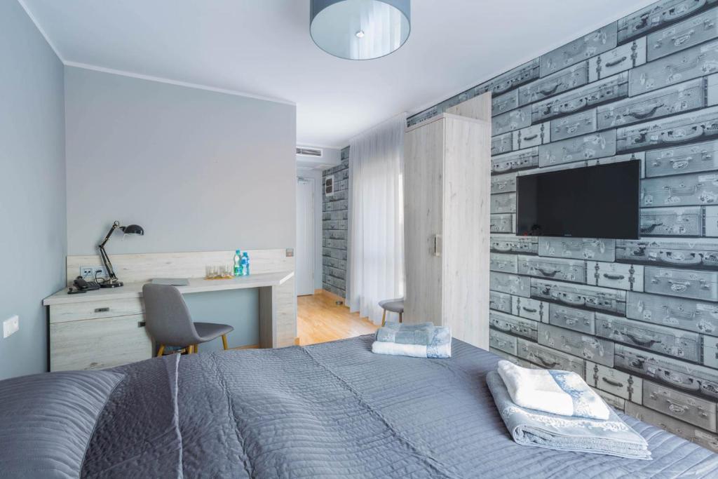 TV a/nebo společenská místnost v ubytování MOTEL MO&JA