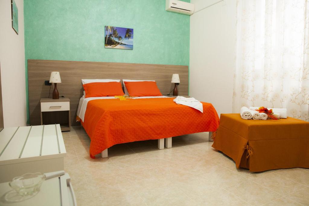 Postel nebo postele na pokoji v ubytování B&B Giosy