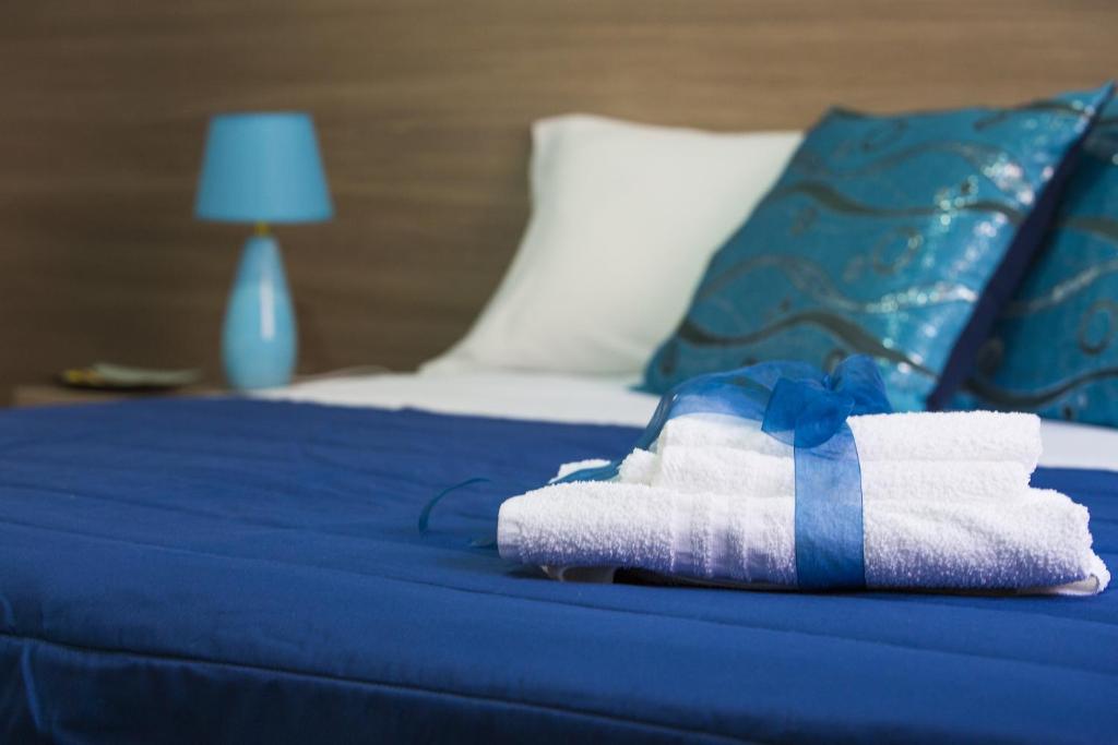 Postel nebo postele na pokoji v ubytování B&B Giosy