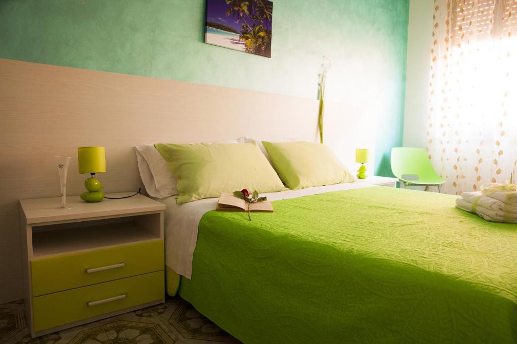 Postel nebo postele na pokoji v ubytování B&B Giosy