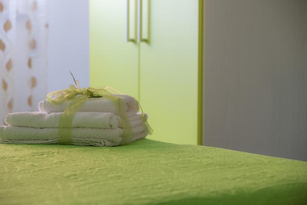 Postel nebo postele na pokoji v ubytování B&B Giosy