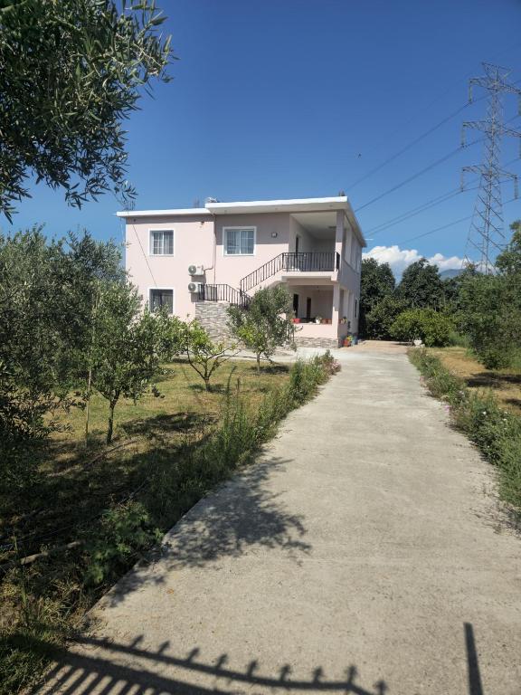 a house on the side of a road at Visi garden house in Valjiosi