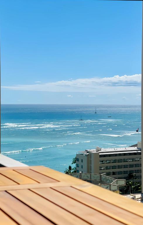 a view of the ocean from the roof of a building at Sweet Blue Hawaii in Honolulu