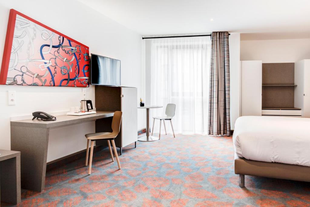 Postel nebo postele na pokoji v ubytování Hotel ParkSaône