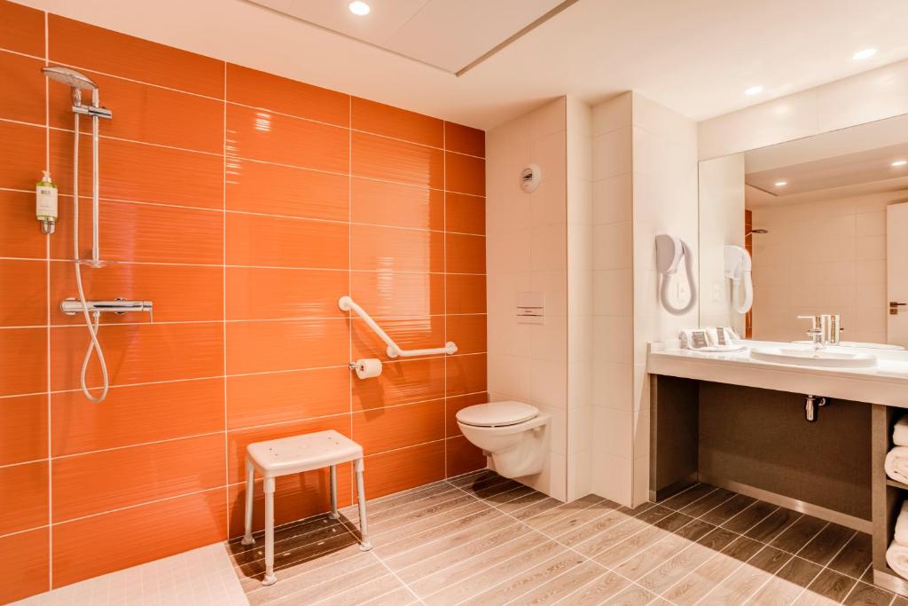 Koupelna v ubytování Hotel ParkSaône