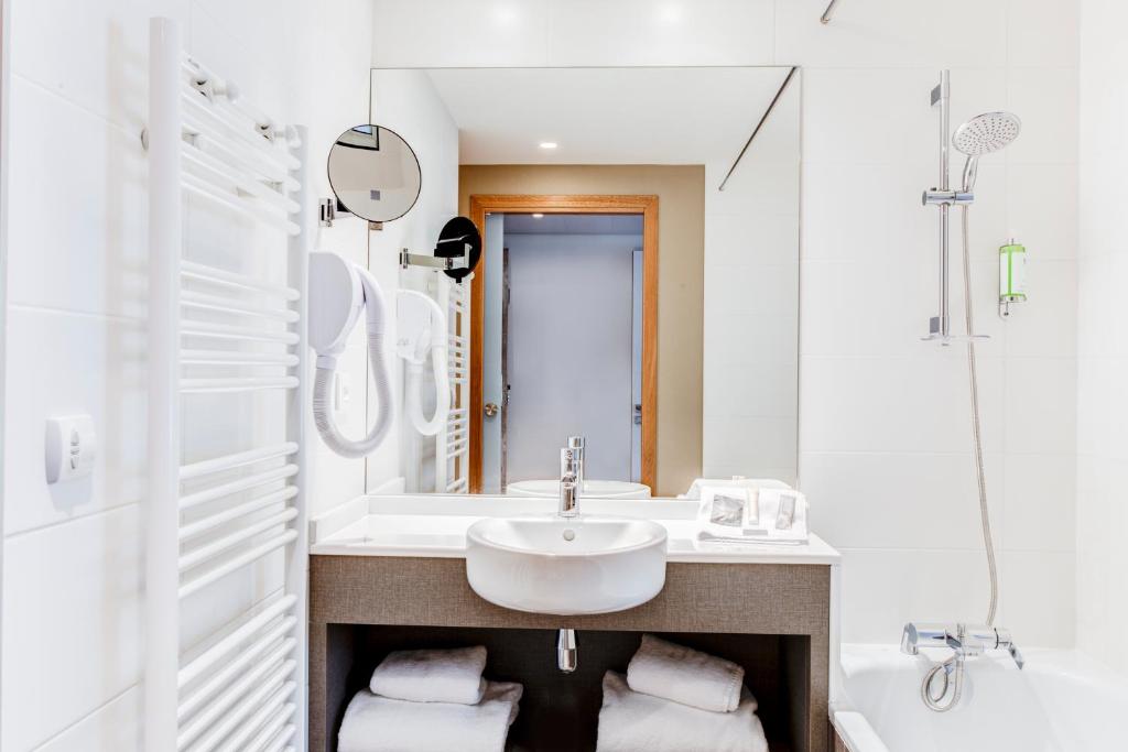 Koupelna v ubytování Hotel ParkSaône