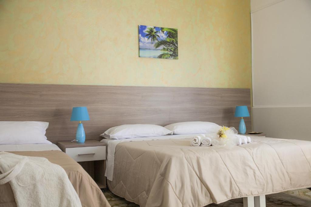 Postel nebo postele na pokoji v ubytování B&B Giosy