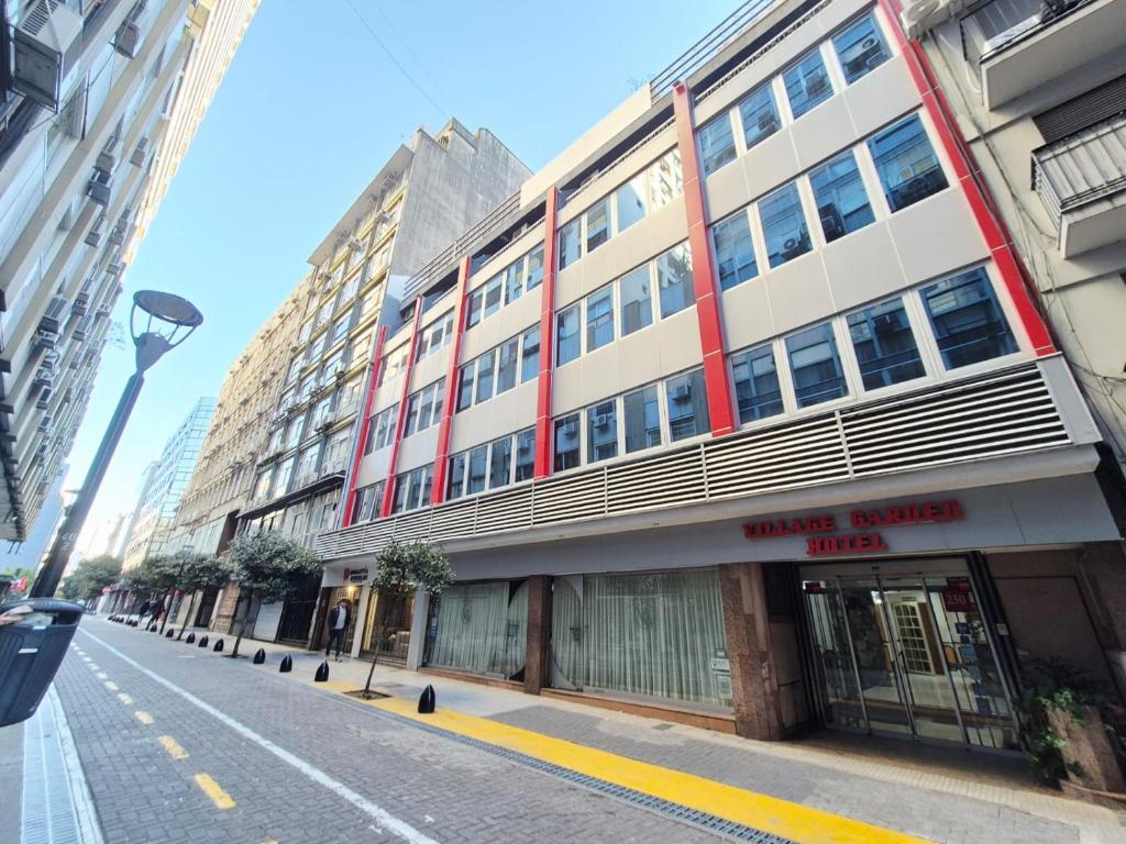 a building on the side of a street at Village Garden Apart Hotel in Buenos Aires