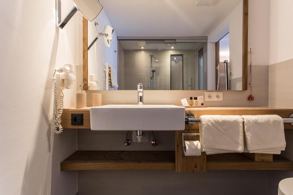 Koupelna v ubytování Hotel Weisseespitze