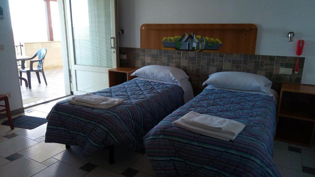 Posteľ alebo postele v izbe v ubytovaní Bed & Breakfast La Collinetta