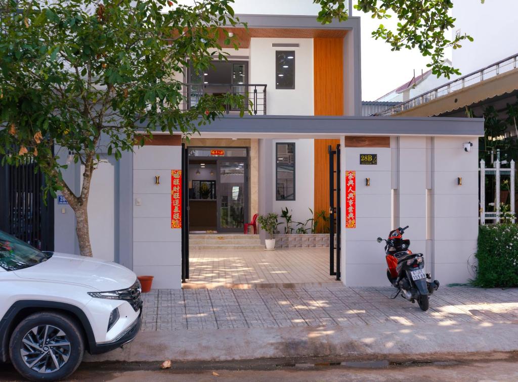 a motorcycle parked in front of a building at Central Phu Quoc Villa in Phú Quốc