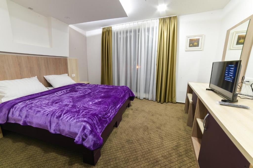 Postel nebo postele na pokoji v ubytování Patria Villa