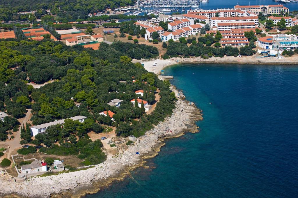 an aerial view of a small island in the water at Verudela Villas in Pula