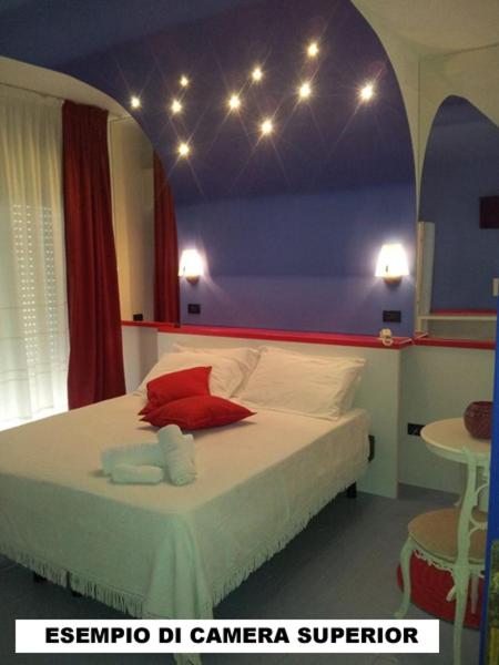 Postel nebo postele na pokoji v ubytování Hotel Alba