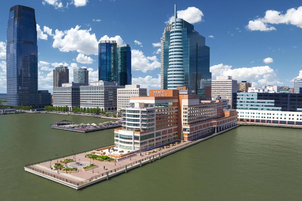an aerial view of a city with tall buildings at Hyatt Regency Jersey City on the Hudson in Jersey City