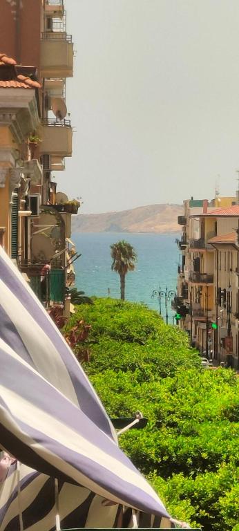 a view of the ocean from a street with buildings at Lungomare Crotone in Crotone
