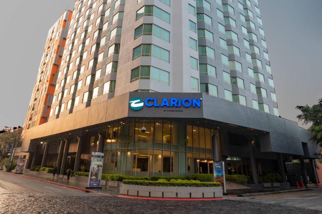 a building with a clandon sign on the front of it at Clarion Suites Guatemala City in Guatemala