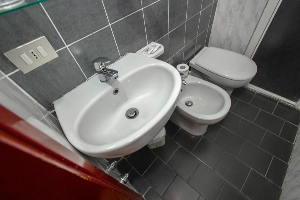 Koupelna v ubytování Hotel Masaccio