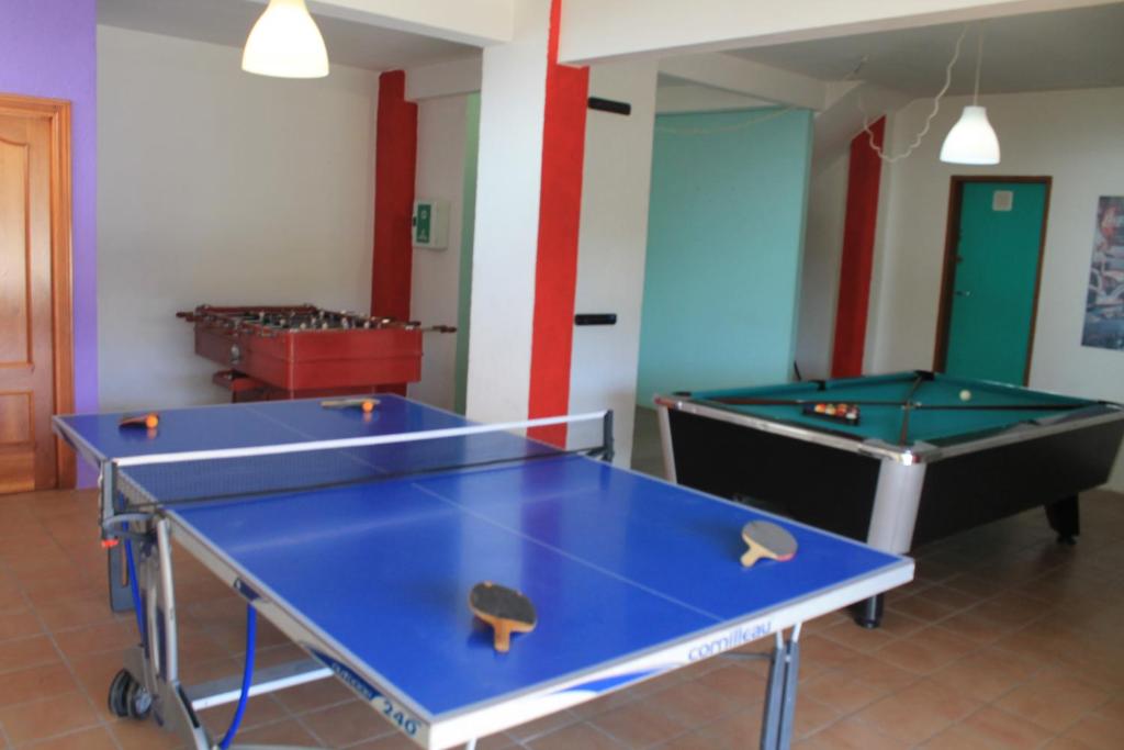 two ping pong tables in a room at Villa Claudia in Lloret de Mar