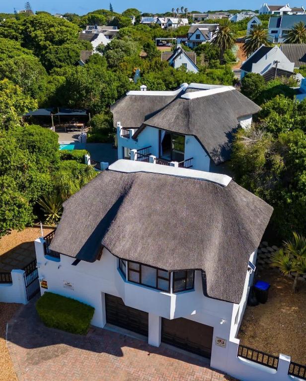 an aerial view of a house with a roof at La Casita House in St Francis Bay