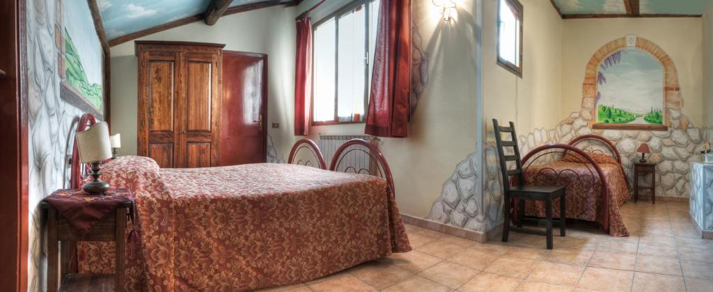 Postel nebo postele na pokoji v ubytování Hotel Masaccio