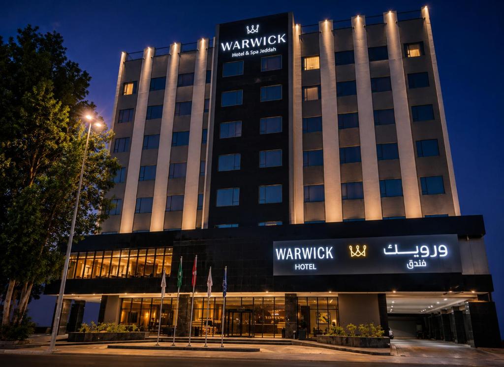 a building with a sign on the front of it at Warwick Hotel Al Safa - Jeddah in Jeddah
