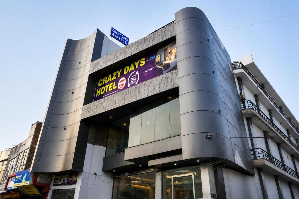 a building with a sign on the side of it at Crazzy Days Hotel I Sonipat in Sonīpat