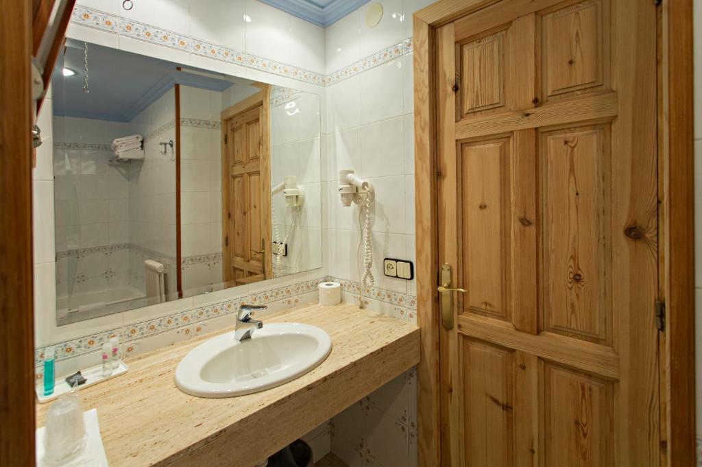 Koupelna v ubytování Hotel La Coma